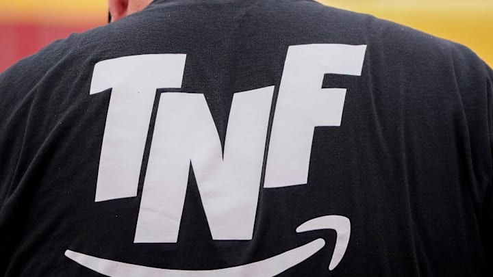 A general view of the Amazon Thursday Night Football logo on a worker   s shirt prior to a game between the Kansas City Chiefs and Denver Broncos at GEHA Field at Arrowhead Stadium.