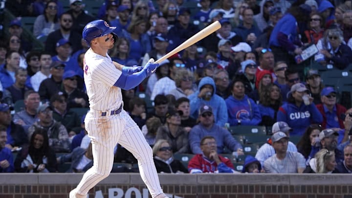 Oct 2, 2022; Chicago, Illinois, USA; Chicago Cubs shortstop Nico Hoerner (2) hits a sacrifice fly