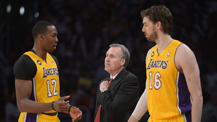 Apr 17, 2013; Los Angeles, CA, USA; Los Angeles Lakers coach Mike D'Antoni (center) talks with center Dwight Howard (12) and forward Pau Gasol (16) during the game against the Houston Rockets at the Staples Center. The Lakers defeated the Rockets 99-95 in overtime. Mandatory Credit: Kirby Lee-Imagn Images Apr 17, 2013; Los Angeles, CA, USA; Los Angeles Lakers coach Mike D'Antoni (center) talks with center Dwight Howard (12) and forward Pau Gasol (16) during the game against the Houston Rockets at the Staples Center. The Lakers defeated the Rockets 99-95 in overtime. Mandatory Credit: Kirby Lee-Imagn Images