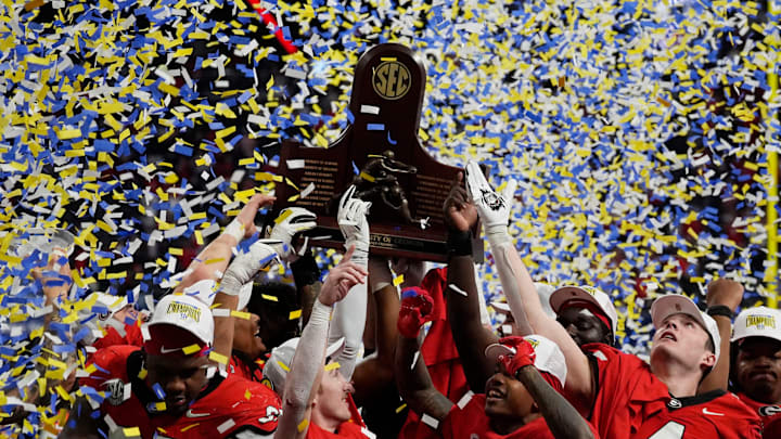 Georgia celebrates after the winning the SEC championship game against Texas in Atlanta, on Saturday, Dec. 7, 2024. Georgia won 22-19.