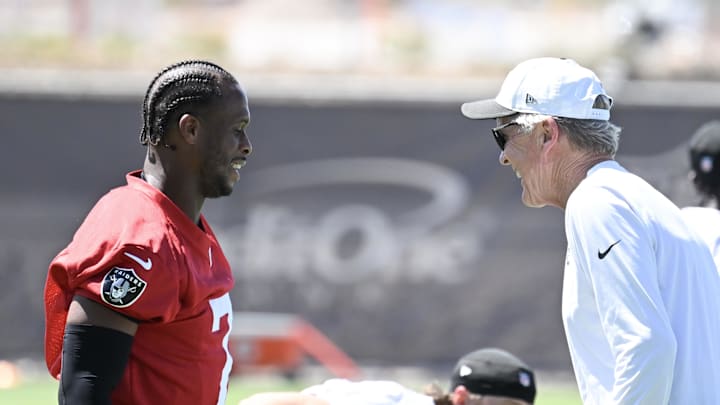Jun 10, 2025; Henderson, NV, USA; Las Vegas Raiders quarterback Geno Smith (7) and head coach Pete Carroll during Las Vegas Raiders Minicamp at Intermountain Health Performance Center. Mandatory Credit: Candice Ward-Imagn Images Jun 10, 2025; Henderson, NV, USA; Las Vegas Raiders quarterback Geno Smith (7) and head coach Pete Carroll during Las Vegas Raiders Minicamp at Intermountain Health Performance Center. Mandatory Credit: Candice Ward-Imagn Images