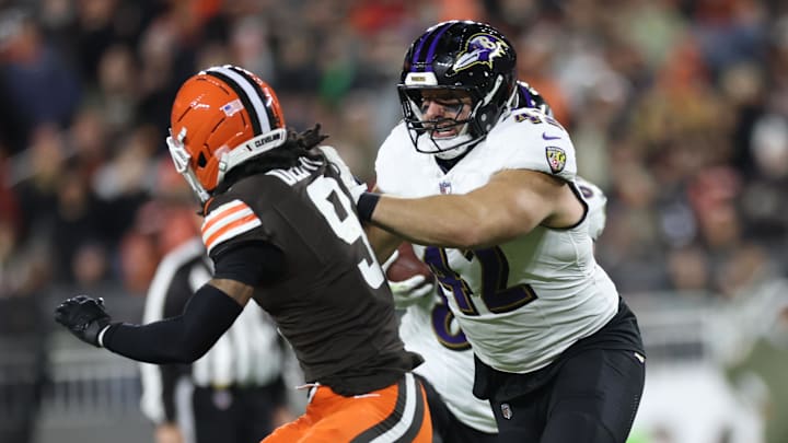 Nov 16, 2025; Cleveland, Ohio, USA; Baltimore Ravens fullback Patrick Ricard (42) blocks Cleveland Browns safety Grant Delpit (9) during the third quarter at Huntington Bank Field. Mandatory Credit: Scott Galvin-Imagn Images