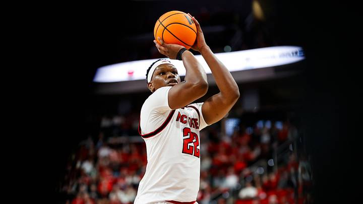 Dec 6, 2025; Raleigh, North Carolina, USA; NC State Wolfpack forward Ven-Allen Lubin (22) shoots a free throw during the first half of the game against UNC Asheville Bulldogs at Lenovo Center. Mandatory Credit: Jaylynn Nash-Imagn Images