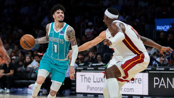 Oct 28, 2025; Miami, Florida, USA; Charlotte Hornets guard LaMelo Ball (1) dribbles the basketball as Miami Heat center Bam Adebayo (13) defends during the second quarter at Kaseya Center. Mandatory Credit: Sam Navarro-Imagn Images Oct 28, 2025; Miami, Florida, USA; Charlotte Hornets guard LaMelo Ball (1) dribbles the basketball as Miami Heat center Bam Adebayo (13) defends during the second quarter at Kaseya Center. Mandatory Credit: Sam Navarro-Imagn Images