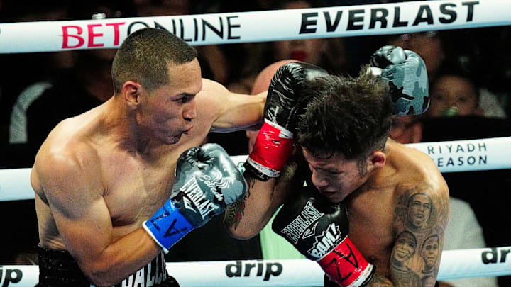 Juan Francisco Estrada throws a punch at Jesse ‘Bam’ Rodriguez during the Matchroom Boxing Main Event at the Footprint Center on June 29, 2024, in Phoenix.
