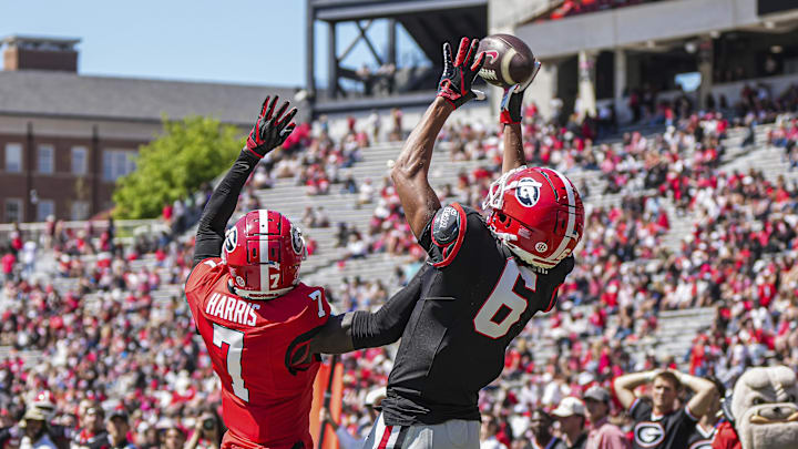 Apr 12, 2025; Athens, GA, USA; Georgia Bulldogs wide receiver CJ Wiley (6) tries to make a catch behind defensive back Daniel Harris (7) during the Georgia Spring game at Sanford Stadium. Mandatory Credit: Dale Zanine-Imagn Images