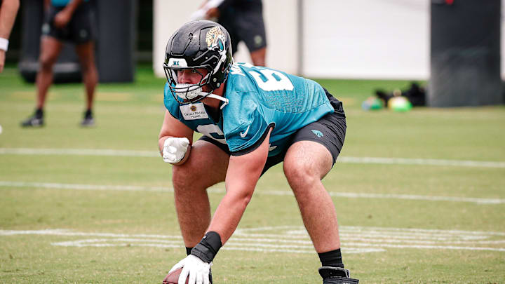 May 10, 2025; Jacksonville, FL, USA; Jacksonville Jaguars offensive lineman Wyatt Milum (64) prepares to snap the ball during rookie minicamp at Miller Electric Center. Mandatory Credit: Travis Register-Imagn Images