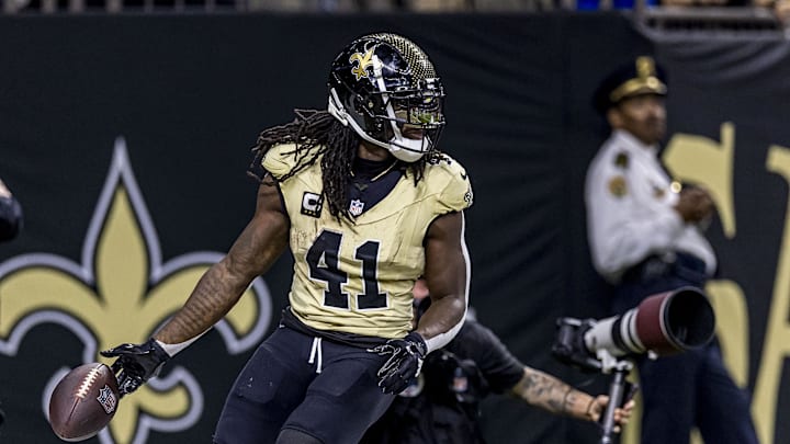 Sep 7, 2025; New Orleans, Louisiana, USA; New Orleans Saints running back Alvin Kamara (41) scores a touch down during the second quarter at Caesars Superdome. Mandatory Credit: Stephen Lew-Imagn Images