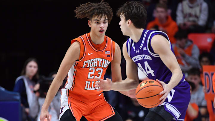 Feb 4, 2026; Champaign, Illinois, USA;  Illinois Fighting Illini guard Keaton Wagler (23) guards Northwestern Wildcats guard Angelo Ciaravino (44) during the first half at State Farm Center. Mandatory Credit: Ron Johnson-Imagn Images
