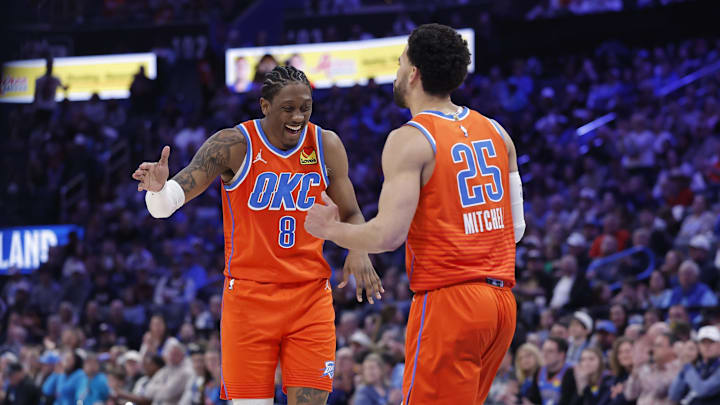 Jan 11, 2026; Oklahoma City, Oklahoma, USA; Oklahoma City Thunder guard/forward Jalen Williams (8) and guard Ajay Mitchell (25) celebrate after scoring against the Miami Heat during the second half at Paycom Center. Mandatory Credit: Alonzo Adams-Imagn Images