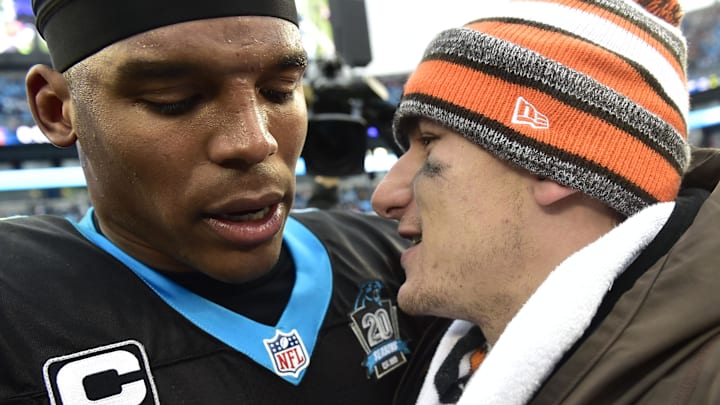 Dec 21, 2014; Charlotte, NC, USA; Carolina Panthers quarterback Cam Newton (1) with Cleveland Browns quarterback Johnny Manziel (2) after the game. The Panthers defeated the Browns 17-13 at Bank of America Stadium. Mandatory Credit: Bob Donnan-Imagn Images