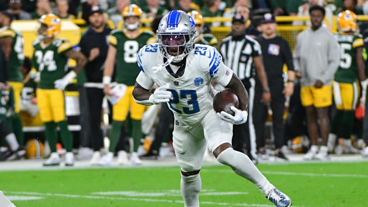 Sep 28, 2023; Green Bay, Wisconsin, USA;  Detroit Lions defensive back Jerry Jacobs (23) returns an interception in the second quarter against the Green Bay Packersat Lambeau Field. Mandatory Credit: Benny Sieu-Imagn Images