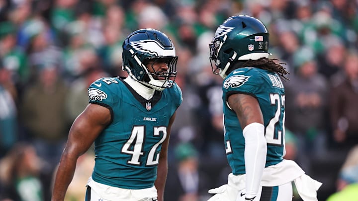 Jan 12, 2025; Philadelphia, Pennsylvania, USA; Philadelphia Eagles linebacker Oren Burks (42) reacts with cornerback Kelee Ringo (22) against the Green Bay Packers in an NFC wild card game at Lincoln Financial Field. Jan 12, 2025; Philadelphia, Pennsylvania, USA; Philadelphia Eagles linebacker Oren Burks (42) reacts with cornerback Kelee Ringo (22) against the Green Bay Packers in an NFC wild card game at Lincoln Financial Field.