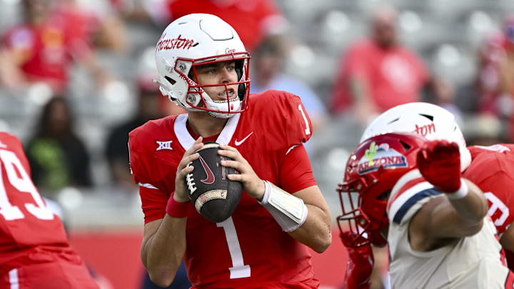 Oct 18, 2025; Houston, Texas, USA; Houston Cougars quarterback Conner Weigman (1) looks to pass the ball during the first half against the Arizona Wildcats at TDECU Stadium. Mandatory Credit: Maria Lysaker-Imagn Images 