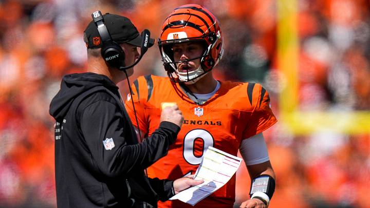 Cincinnati Bengals quarterback Joe Burrow (9) checks in with head coach Zac Taylor between plays in the second quarter of the NFL Week 1 game between the Cincinnati Bengals and the Tampa Bay Buccaneers at Paycor Stadium in Cincinnati on Sunday, Sept. 13, 2026. Cincinnati Bengals quarterback Joe Burrow (9) checks in with head coach Zac Taylor between plays in the second quarter of the NFL Week 1 game between the Cincinnati Bengals and the Tampa Bay Buccaneers at Paycor Stadium in Cincinnati on Sunday, Sept. 13, 2026.