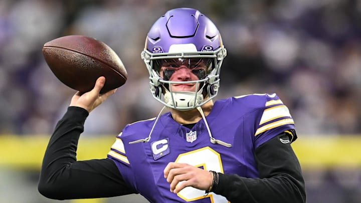 Jan 4, 2026; Minneapolis, Minnesota, USA; Minnesota Vikings quarterback J.J. McCarthy (9) warms up prior to the game against the Green Bay Packers at U.S. Bank Stadium. Mandatory Credit: Jeffrey Becker-Imagn Images
