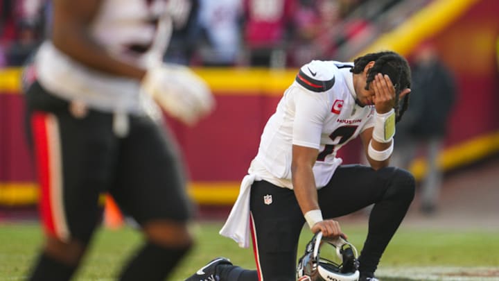 Dec 21, 2024; Kansas City, Missouri, USA; Houston Texans quarterback C.J. Stroud (7) reacts after an injury to wide receiver Tank Dell (not pictured) during the second half against the Kansas City Chiefs at GEHA Field at Arrowhead Stadium. Mandatory Credit: Jay Biggerstaff-Imagn Images