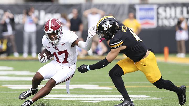 Oct 11, 2025; Columbia, Missouri, USA; Alabama Crimson Tide wide receiver Lotzeir Brooks (17) runs the ball against Missouri Tigers safety Trajen Greco (4) during the second half at Faurot Field at Memorial Stadium. Mandatory Credit: Reese Strickland-Imagn Images Oct 11, 2025; Columbia, Missouri, USA; Alabama Crimson Tide wide receiver Lotzeir Brooks (17) runs the ball against Missouri Tigers safety Trajen Greco (4) during the second half at Faurot Field at Memorial Stadium. Mandatory Credit: Reese Strickland-Imagn Images