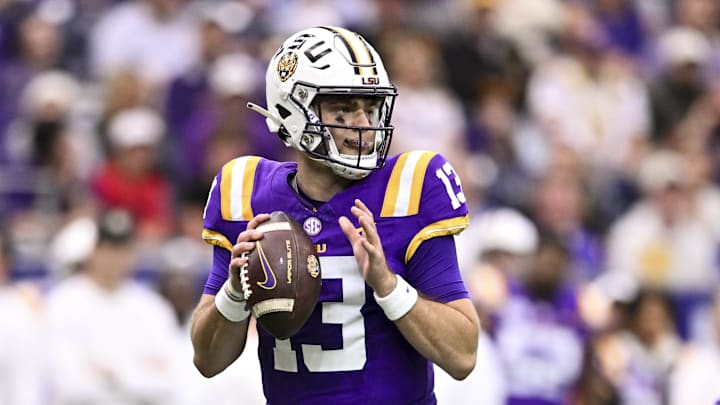 Dec 31, 2024; Houston, TX, USA; LSU Tigers quarterback Garrett Nussmeier (13) throws a pass during the first half against the Baylor Bears at NRG Stadium. The Tigers defeat the Bears 44-31. Mandatory Credit: Maria Lysaker-Imagn Images 