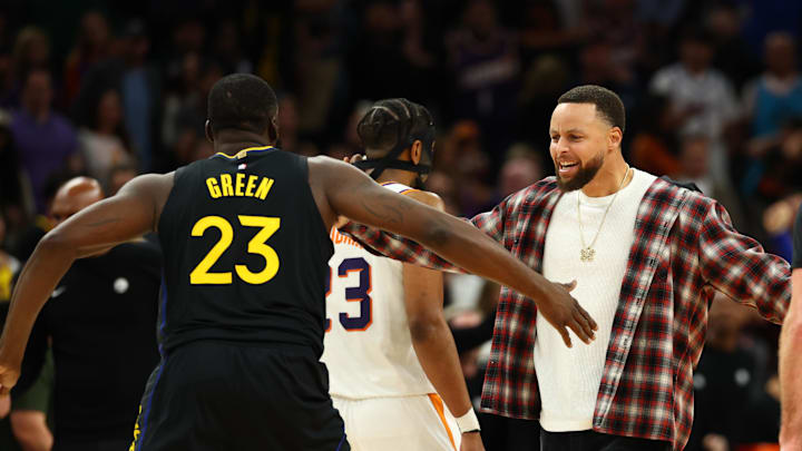 Feb 5, 2026; Phoenix, Arizona, USA; Golden State Warriors guard Stephen Curry celebrates with forward Draymond Green (23) against the Phoenix Suns in the second half at Mortgage Matchup Center. Mandatory Credit: Mark J. Rebilas-Imagn Images Feb 5, 2026; Phoenix, Arizona, USA; Golden State Warriors guard Stephen Curry celebrates with forward Draymond Green (23) against the Phoenix Suns in the second half at Mortgage Matchup Center. Mandatory Credit: Mark J. Rebilas-Imagn Images