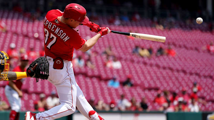 Cincinnati Reds catcher Tyler Stephenson (37) hits a three-run double.