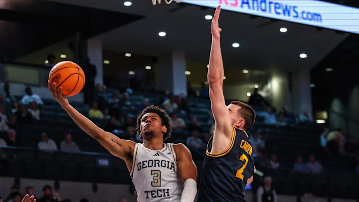 Mar 4, 2026; Atlanta, Georgia, USA; Georgia Tech Yellow Jackets guard Jaeden Mustaf (3) attempts a shot against California Golden Bears forward John Camden (2) during the second half at McCamish Pavilion. Mandatory Credit: Jordan Godfree-Imagn Images