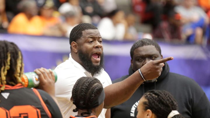 Coach Cornelius Ingram points to a player in the fourth quarter as they mounted a come behind win Hawthorne Hs Hornets vs the Graceville Tigers at the FHSAA Girls 1A Championship at the RP Funding Center in Lakeland Fl. Saturday March 2nd 2024, 2024 Photo by Calvin Knight