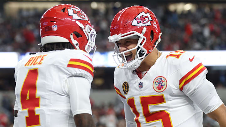 Nov 27, 2025; Arlington, Texas, USA; Kansas City Chiefs wide receiver Rashee Rice (4) and Kansas City Chiefs quarterback Patrick Mahomes (15) celebrate after a play against the Dallas Cowboys during the first quarter at AT&T Stadium. Mandatory Credit: Kevin Jairaj-Imagn Images