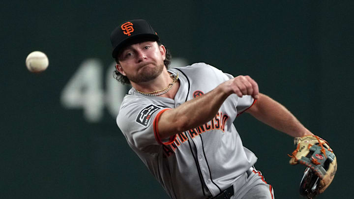 Sep 24, 2024; Phoenix, Arizona, USA; San Francisco Giants shortstop Brett Wisely (0) makes the play against the Arizona Diamondbacks in the ninth inning at Chase Field. Mandatory Credit: Rick Scuteri-Imagn Images