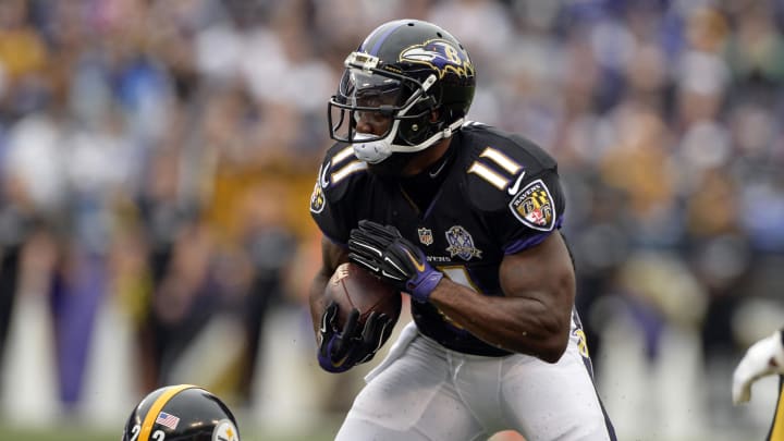 Dec 27, 2015; Baltimore, MD, USA; Baltimore Ravens wide receiver Kamar Aiken (11) runs after the catch during the first quarter against the Pittsburgh Steelers at M&T Bank Stadium. Mandatory Credit: Tommy Gilligan-USA TODAY Sports