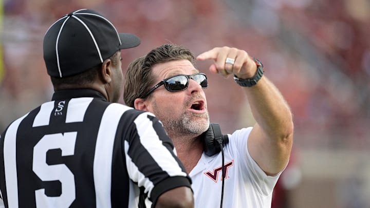 Oct 7, 2023; Tallahassee, Florida, USA; Virginia Tech Hokies head coach Brent Pry speaks with a referee on the sidelines during the second half against the Florida State Seminoles at Doak S. Campbell Stadium. Mandatory Credit: Melina Myers-USA TODAY Sports