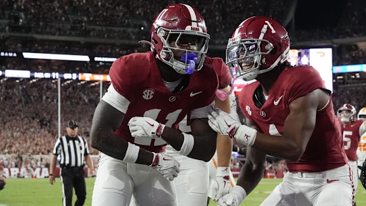 Oct 18, 2025; Tuscaloosa, Alabama, USA; Alabama Crimson Tide wide receiver Rico Scott (11) celebrates a touchdown  in the second half against the Tennessee Volunteers at Saban Field at Bryant-Denny Stadium. Mandatory Credit: Gary Cosby-USA TODAY Network via Imagn Images