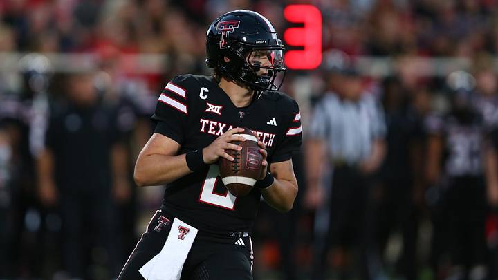 Sep 28, 2024; Lubbock, Texas, USA;  Texas Tech Red Raiders quarterback Behren Morton (2) passes against the Cincinnati Bearcats in the first half at Jones AT&T Stadium and Cody Campbell Field. Mandatory Credit: Michael C. Johnson-Imagn Images