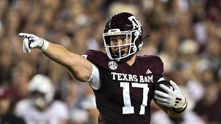 Nov 16, 2024; College Station, Texas, USA; Texas A&M Aggies tight end Theo Melin Ohrstrom (17) motions during the first quarter against the New Mexico State Aggies at Kyle Field. Mandatory Credit: Maria Lysaker-Imagn Images 