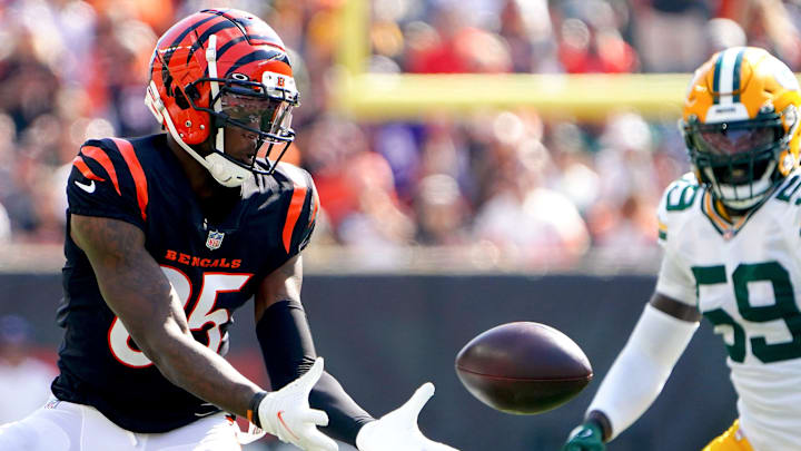 Cincinnati Bengals wide receiver Tee Higgins catches a pass against De'Vondre Campbell during a game vs. the Packers in 2021. Cincinnati Bengals wide receiver Tee Higgins catches a pass against De'Vondre Campbell during a game vs. the Packers in 2021.