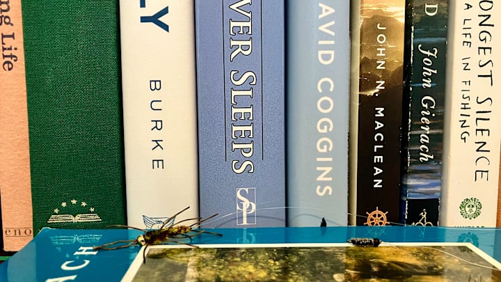 A two-fly nymph rig, featuring some reading material. 