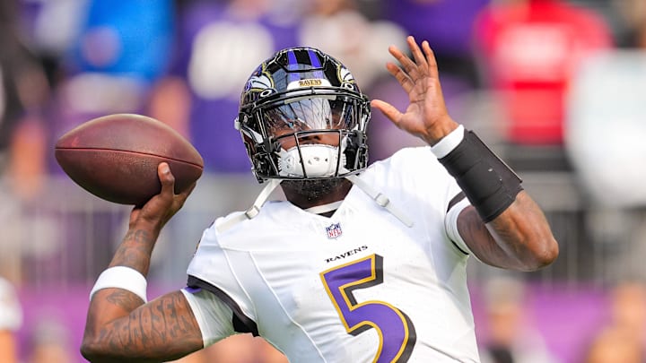 Nov 9, 2025; Minneapolis, Minnesota, USA; Baltimore Ravens quarterback Tyler Huntley (5) warms up before the game against the Minnesota Vikings at U.S. Bank Stadium. Mandatory Credit: Brad Rempel-Imagn Images