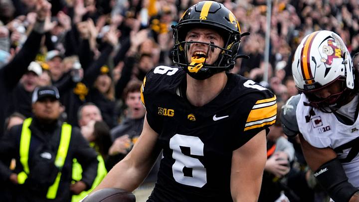 Iowa Hawkeyes defensive back Zach Lutmer (6) reacts after scoring a pick-6 against the Minnesota Golden Gophers Oct. 25, 2025 at Kinnick Stadium in Iowa City, Iowa. Iowa Hawkeyes defensive back Zach Lutmer (6) reacts after scoring a pick-6 against the Minnesota Golden Gophers Oct. 25, 2025 at Kinnick Stadium in Iowa City, Iowa.