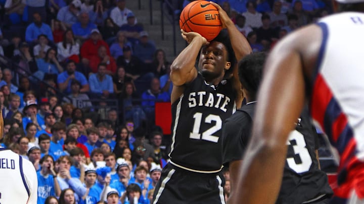 Feb 15, 2025; Oxford, Mississippi, USA; Mississippi State Bulldogs guard Josh Hubbard (12) shoots for three during the first half against the Mississippi Rebels at The Sandy and John Black Pavilion at Ole Miss. Mandatory Credit: Petre Thomas-Imagn Images