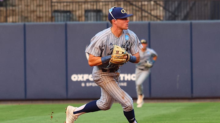 May 31, 2025; Oxford, MS, USA; Georgia Tech Yellowjackets infielder Kyle Lodise (2) fields a ground ball during the second inning against the Murray State Racers. Mandatory Credit: Petre Thomas-Imagn Images
