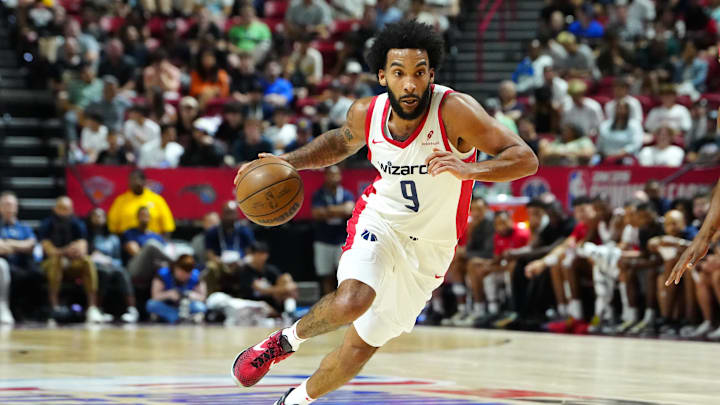 Jul 14, 2024; Las Vegas, NV, USA; Washington Wizards forward Justin Champagnie (9) dribbles against the Houston Rockets during the first quarter at Thomas & Mack Center. Mandatory Credit: Stephen R. Sylvanie-Imagn Images