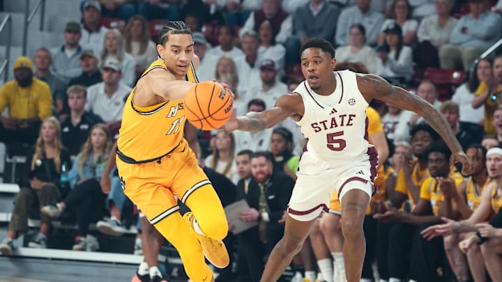 Feb 1, 2025; Starkville, Mississippi, USA; Missouri Tigers forward Trent Pierce (11) grabs a loose ball against Mississippi State Bulldogs guard Shawn Jones Jr. (5) during the first half at Humphrey Coliseum. Mandatory Credit: Wesley Hale-Imagn Images