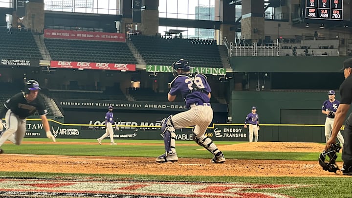 TCU's Anthony Silva attempts a slide at home plate in Thursday's game against Kansas State in the Phillips 66 Big 12 Baseball Championship. 