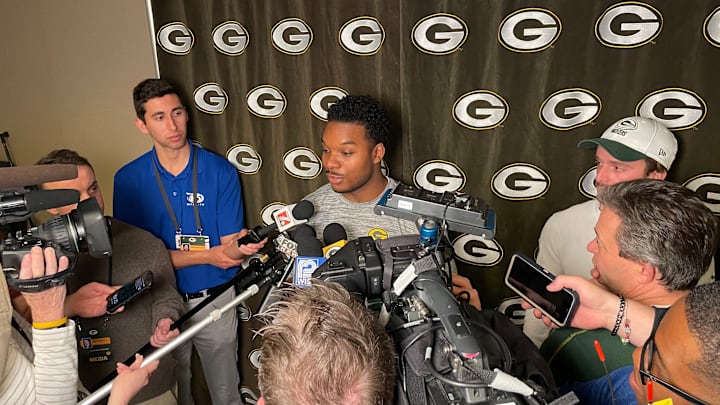Packers rookie Collin Oliver talks to reporters before rookie minicamp.