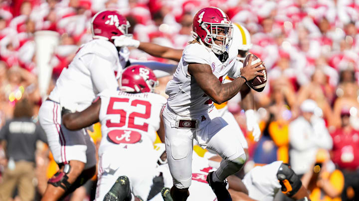 Alabama quarterback Jalen Milroe (4) scrambles during an SEC conference game between Tennessee and Alabama in Neyland Stadium on Saturday, Oct. 19, 2024.