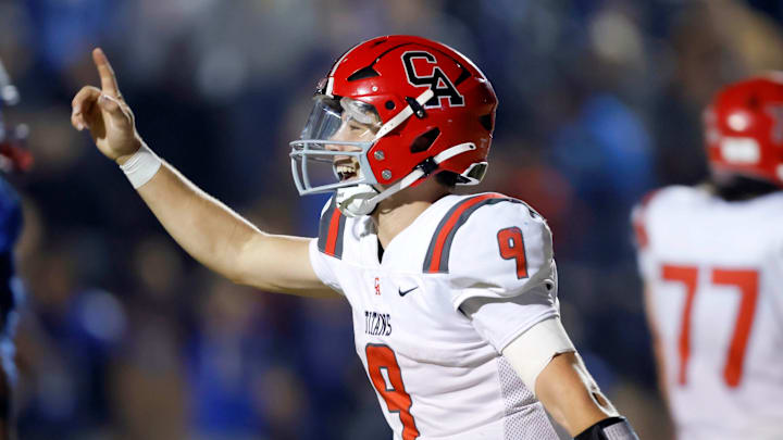 Carl Albert's Kevin Sperry celebrates after throwing a touchdown pass to put Carl ALbert up late in the fourth quarter of a high school football game between Guthrie and Carl Albert in Guthrie, Okla., Thursday, Oct. 19, 2023. Carl Albert won 24-21.