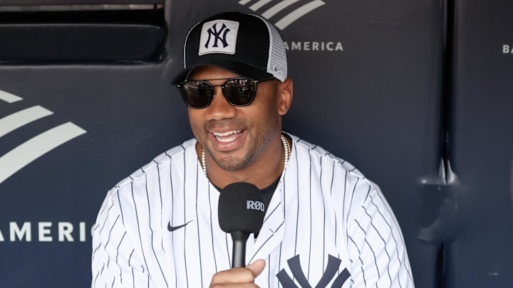 May 18, 2025; Bronx, New York, USA;  New York Giants quarterback Russell Wilson is interviewed prior to the game between the New York Mets and the New York Yankees at Yankee Stadium.  