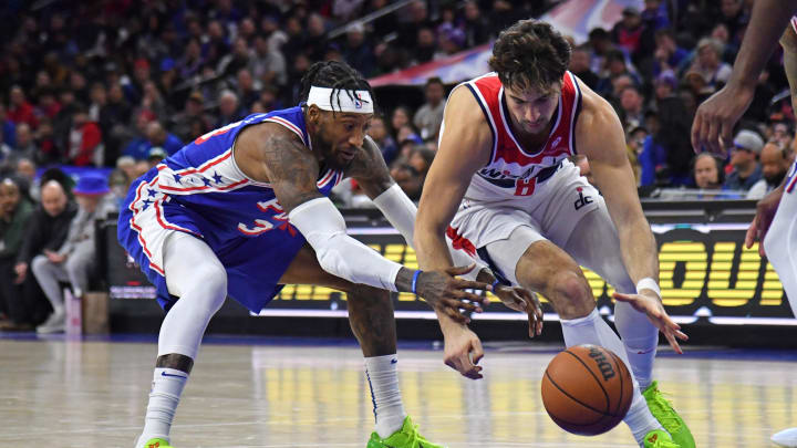 Dec 11, 2023; Philadelphia, Pennsylvania, USA; Philadelphia 76ers forward Robert Covington (33) and Dec 11, 2023; Philadelphia, Pennsylvania, USA; Philadelphia 76ers forward Robert Covington (33) and
