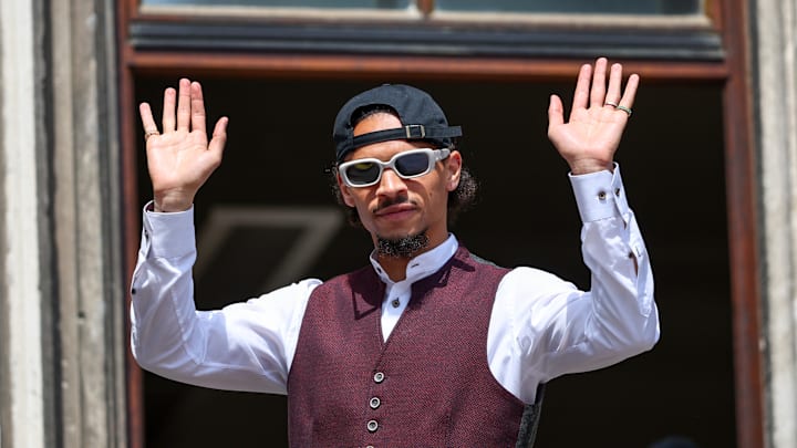 Leroy Sane celebrating Bayern Munich title win in May. 