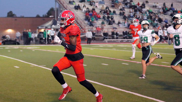 Carl Albert's Trystan Haynes runs for a touchdown